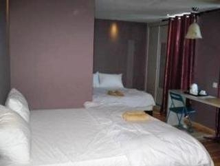 Imagen de la habitación del Hotel I-city. Foto 6