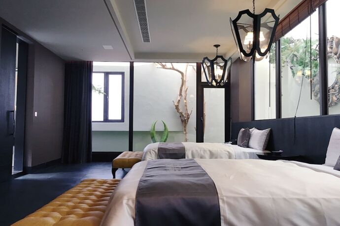 Imagen de la habitación del Hotel Icolour Villa. Foto 12