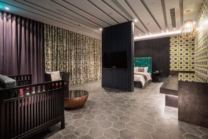 Imagen de la habitación del Hotel Icolour Villa. Foto 13