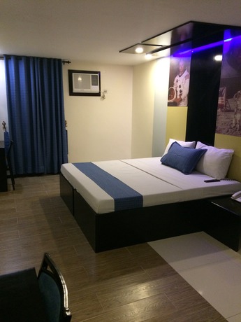 Imagen de la habitación del Hotel Icon Hotel Timog. Foto 7