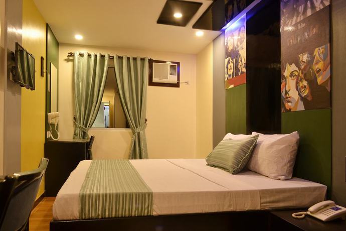 Imagen de la habitación del Hotel Icon Hotel Timog. Foto 12