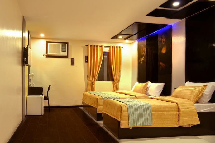 Imagen de la habitación del Hotel Icon Hotel Timog. Foto 13