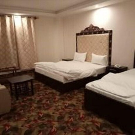 Imagen de la habitación del Hotel Iconic and Restaurant. Foto 16