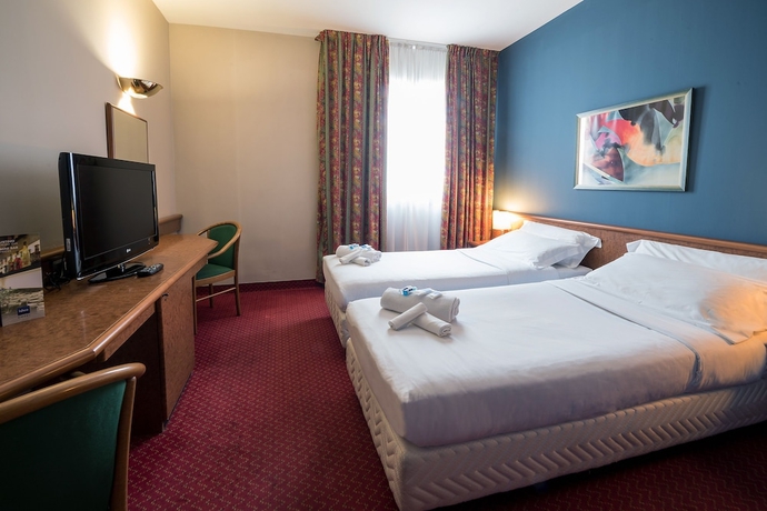 Imagen de la habitación del Hotel Idea Piacenza. Foto 12