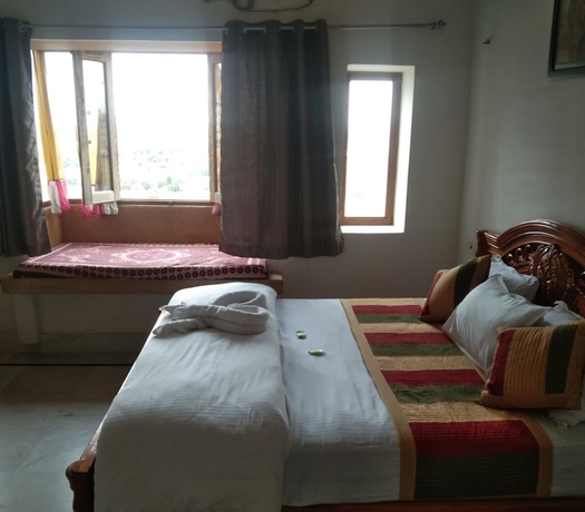 Imagen de la habitación del Hotel Ideal Guest House. Foto 8