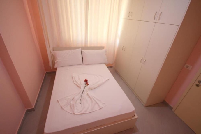 Imagen de la habitación del Hotel Ideal Holiday Apartments. Foto 13
