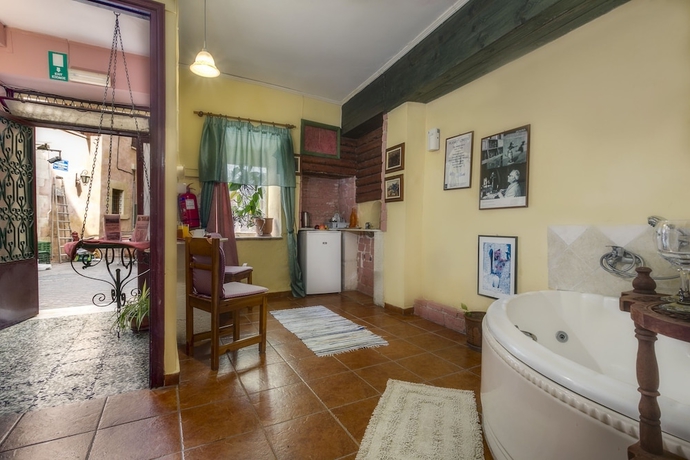 Imagen de la habitación del Hotel Ifigenia Rooms. Foto 12