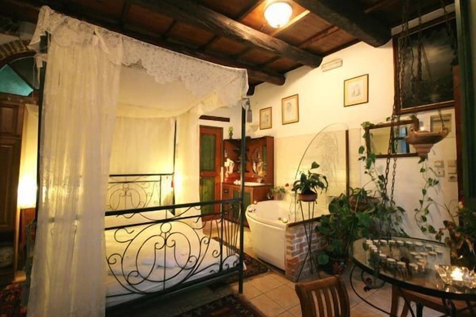 Imagen de la habitación del Hotel Ifigenia Rooms. Foto 15