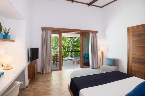 Imagen de la habitación del Hotel Ifuru Island Maldives. Foto 10