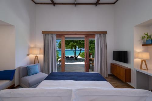 Imagen de la habitación del Hotel Ifuru Island Maldives. Foto 13