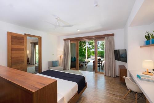 Imagen de la habitación del Hotel Ifuru Island Maldives. Foto 14