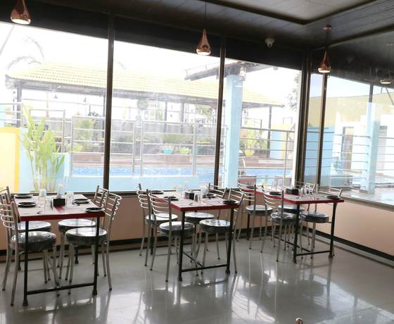 Imagen del bar/restaurante del Hotel Igatpuri Hills Retreat. Foto 6