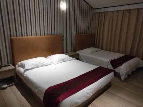 Imagen de la habitación del Hotel Igiban. Foto 15