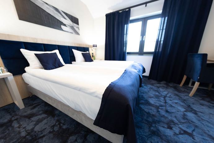 Imagen de la habitación del Hotel Ignasiak. Foto 15