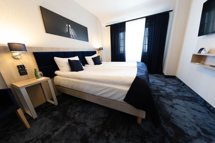 Imagen de la habitación del Hotel Ignasiak. Foto 16