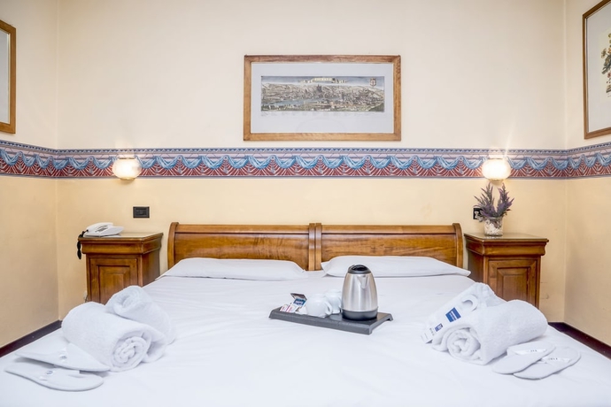 Imagen de la habitación del Hotel Ih Firenze Select. Foto 7