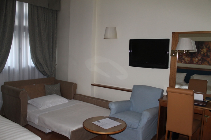 Imagen de la habitación del Hotel Ih Hotels Milano Eur Trezzano Sul Naviglio. Foto 8