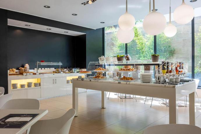 Imagen del bar/restaurante del Hotel Ih Hotels Milano Watt 13. Foto 3