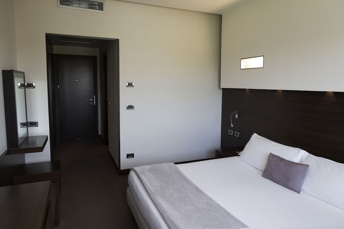 Imagen de la habitación del Hotel Ih Hotels Pomezia Selene. Foto 6