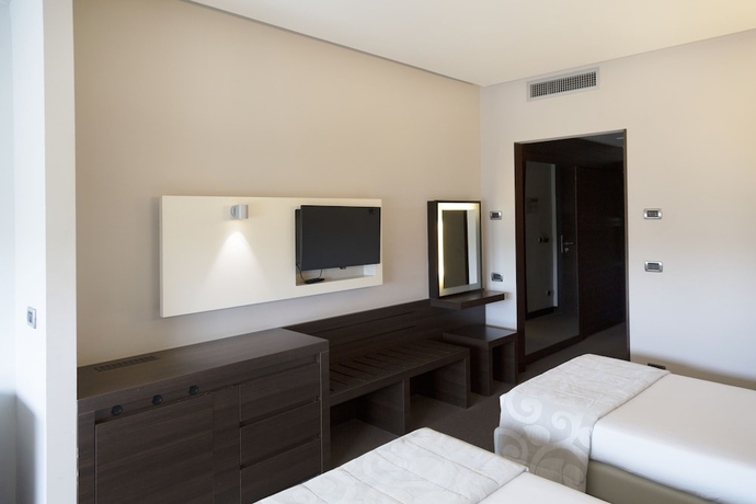 Imagen de la habitación del Hotel Ih Hotels Pomezia Selene. Foto 12