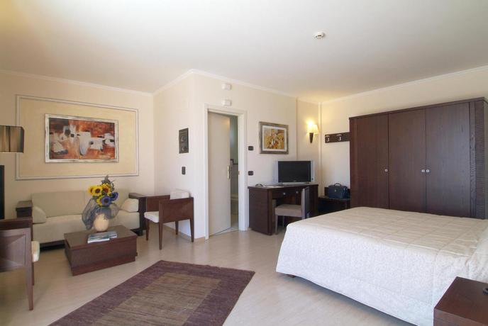 Imagen de la habitación del Hotel Ih Hotels Roma La Mela. Foto 17