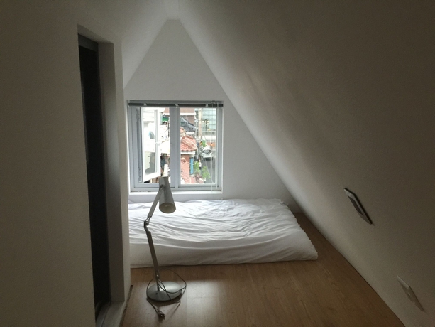 Imagen de la habitación del Hotel Ihouse Chinchin. Foto 8