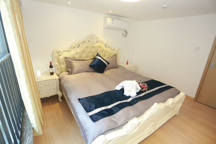 Imagen de la habitación del Hotel Ihouse Executive Apartment. Foto 20