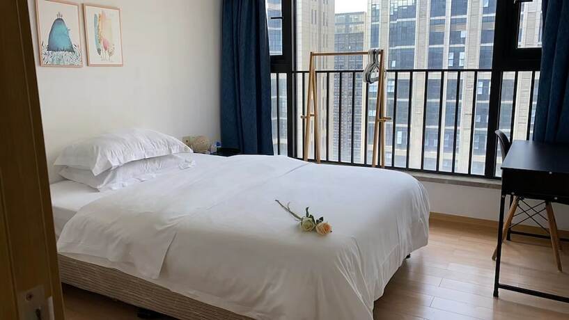Imagen de la habitación del Hotel Ihouse Executive Apartment. Foto 27