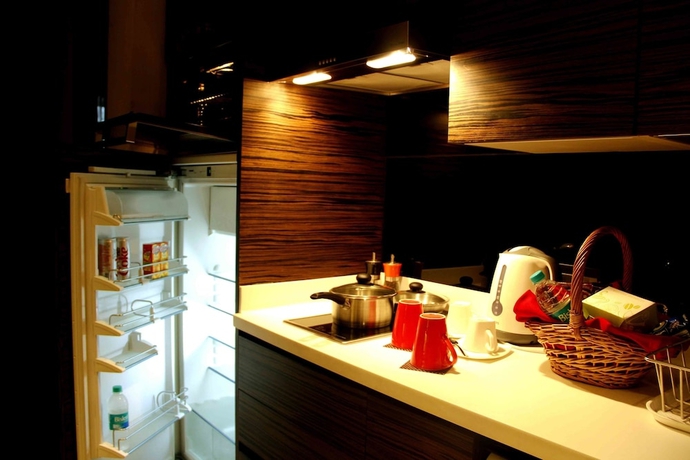 Imagen de la habitación del Hotel Iidl Suites. Foto 12