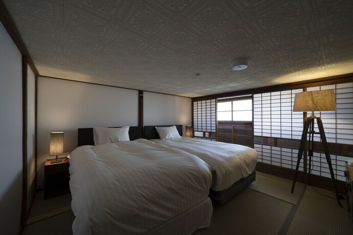 Imagen de la habitación del Hotel Iizukatei. Foto 18