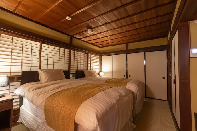 Imagen de la habitación del Hotel Iizukatei. Foto 25
