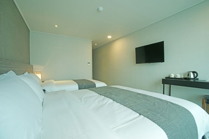Imagen de la habitación del Hotel I-jin. Foto 13