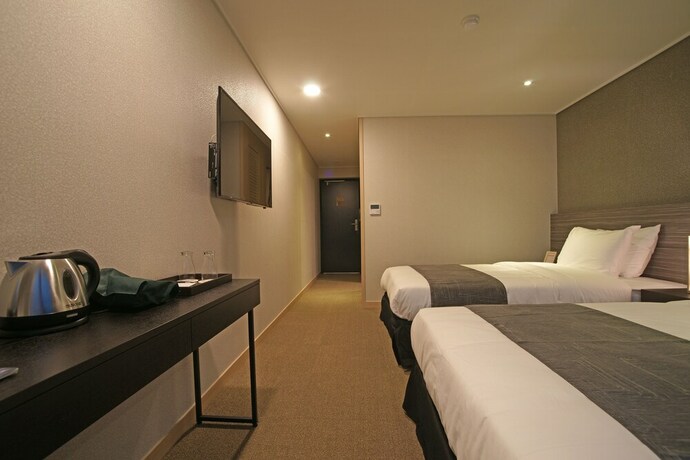 Imagen de la habitación del Hotel I-jin. Foto 14