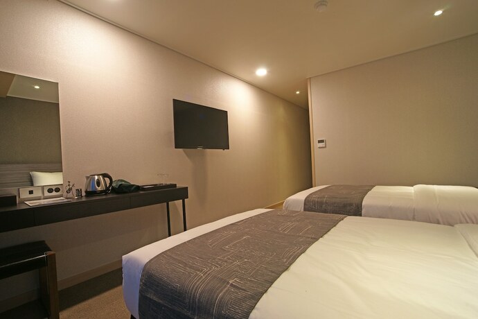 Imagen de la habitación del Hotel I-jin. Foto 15
