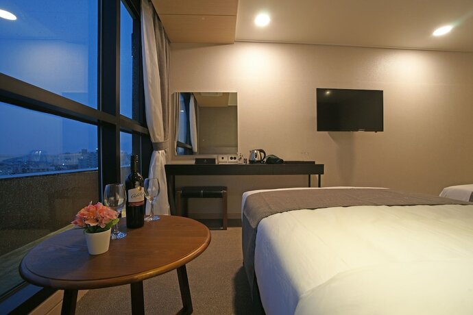 Imagen de la habitación del Hotel I-jin. Foto 17