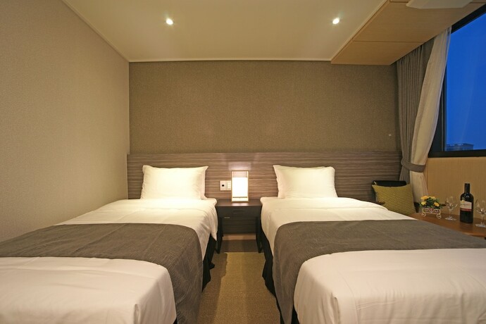 Imagen de la habitación del Hotel I-jin. Foto 22