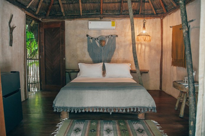 Imagen de la habitación del Hotel Ikal Tulum. Foto 3