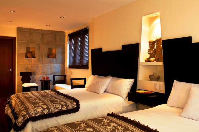 Imagen de la habitación del Hotel Ikala Quito Boutique. Foto 18