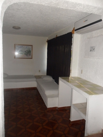Imagen de la habitación del Hotel Ikaro Suites. Foto 4