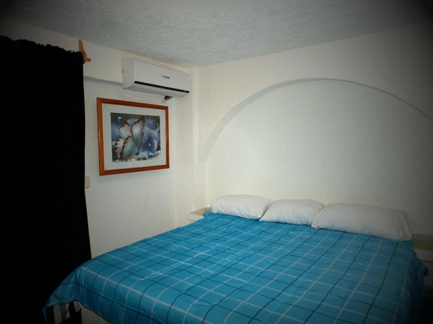 Imagen de la habitación del Hotel Ikaro Suites. Foto 7