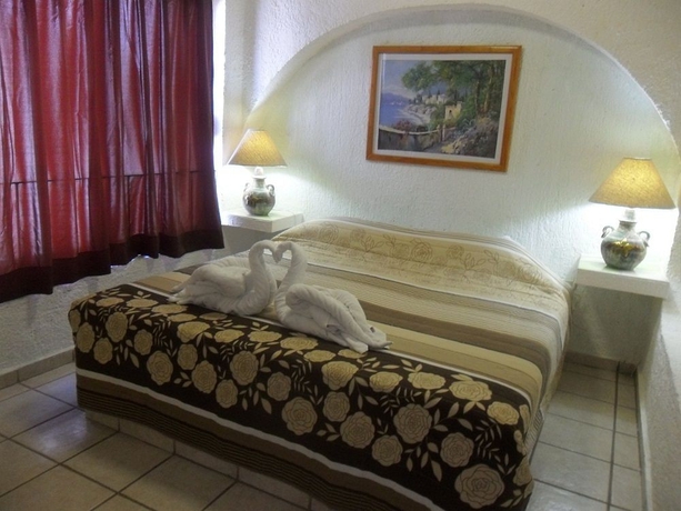 Imagen de la habitación del Hotel Ikaro Suites. Foto 9