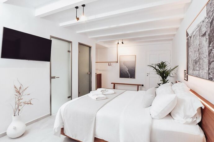 Imagen de la habitación del Hotel Ikaros Suites. Foto 14