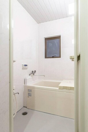Imagen de la habitación del Hotel Ikebukuro Yamase Building GR1. Foto 20