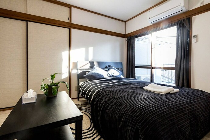 Imagen de la habitación del Hotel Ikebukuro Yamase Building GR1. Foto 21