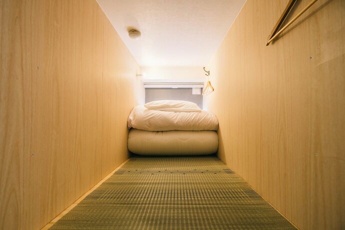 Imagen de la habitación del Hotel Ikidane House Namba Osaka. Foto 12