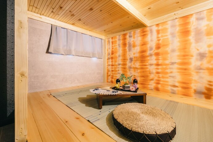 Imagen de la habitación del Hotel Ikidane House Namba Osaka. Foto 18