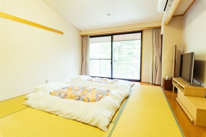 Imagen de la habitación del Hotel Ikoi Villa. Foto 18