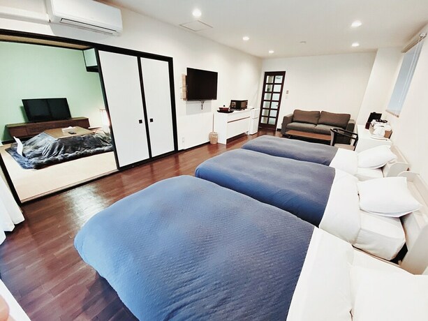 Imagen de la habitación del Hotel Ikoi Villa. Foto 30