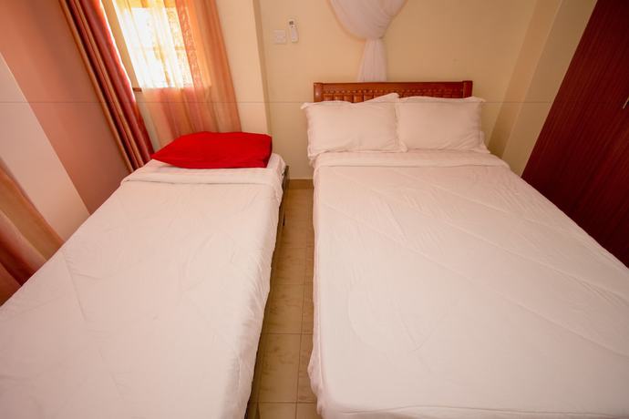 Imagen de la habitación del Hotel Ikonia Resort and. Foto 2
