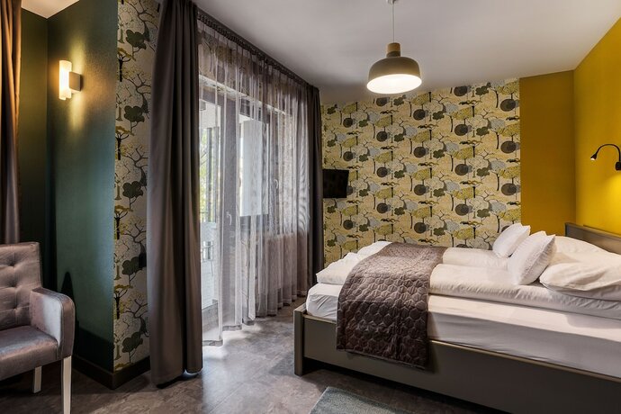Imagen de la habitación del Hotel Ikonik Spa Panzi&oacute;. Foto 15